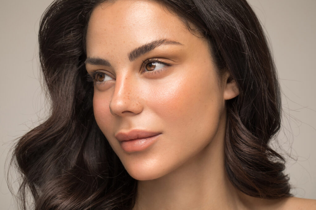 Close-up of full, smooth lips showcasing a lip enhancement treatment at Bloom Spa.